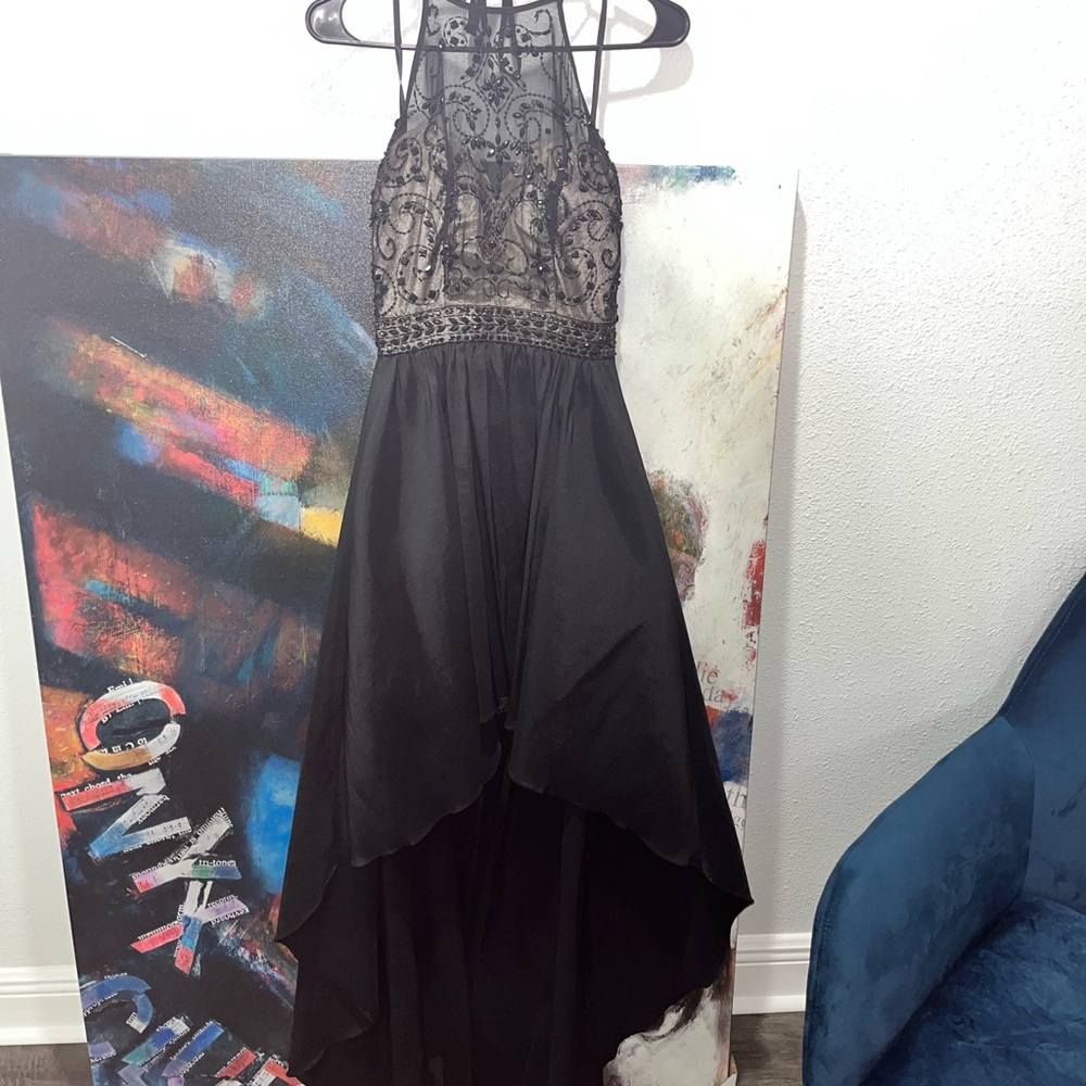 Black backless dress, short in the front long in the back, size 3/4